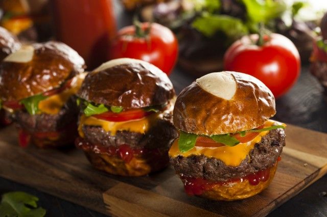 Beef sliders on brioche buns with cheese and salad